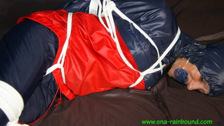 Shiny Nylon Arts Rain Bound are proud to present you with a free photos featuring luscious babe in weird bdsm session